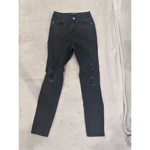 Women’s size 0 black jeans with rips from missguided